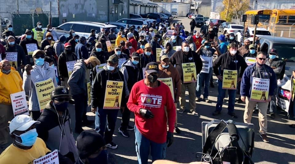 Boston bus drivers take contract struggle to the street